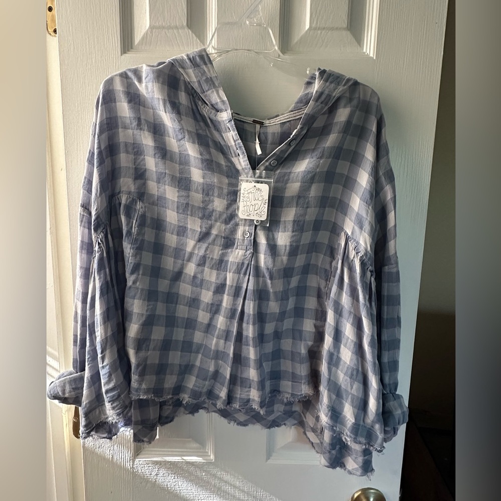 Free people top. Size small. New with tags.